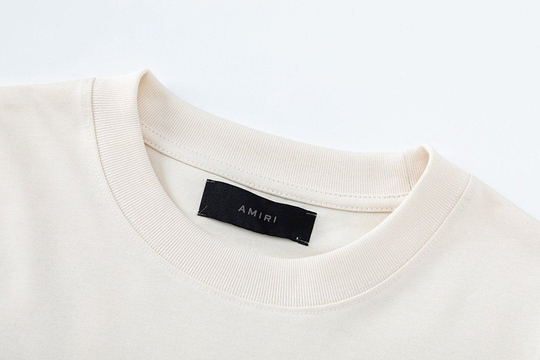 AMIRI graphic logo-print T-shirt